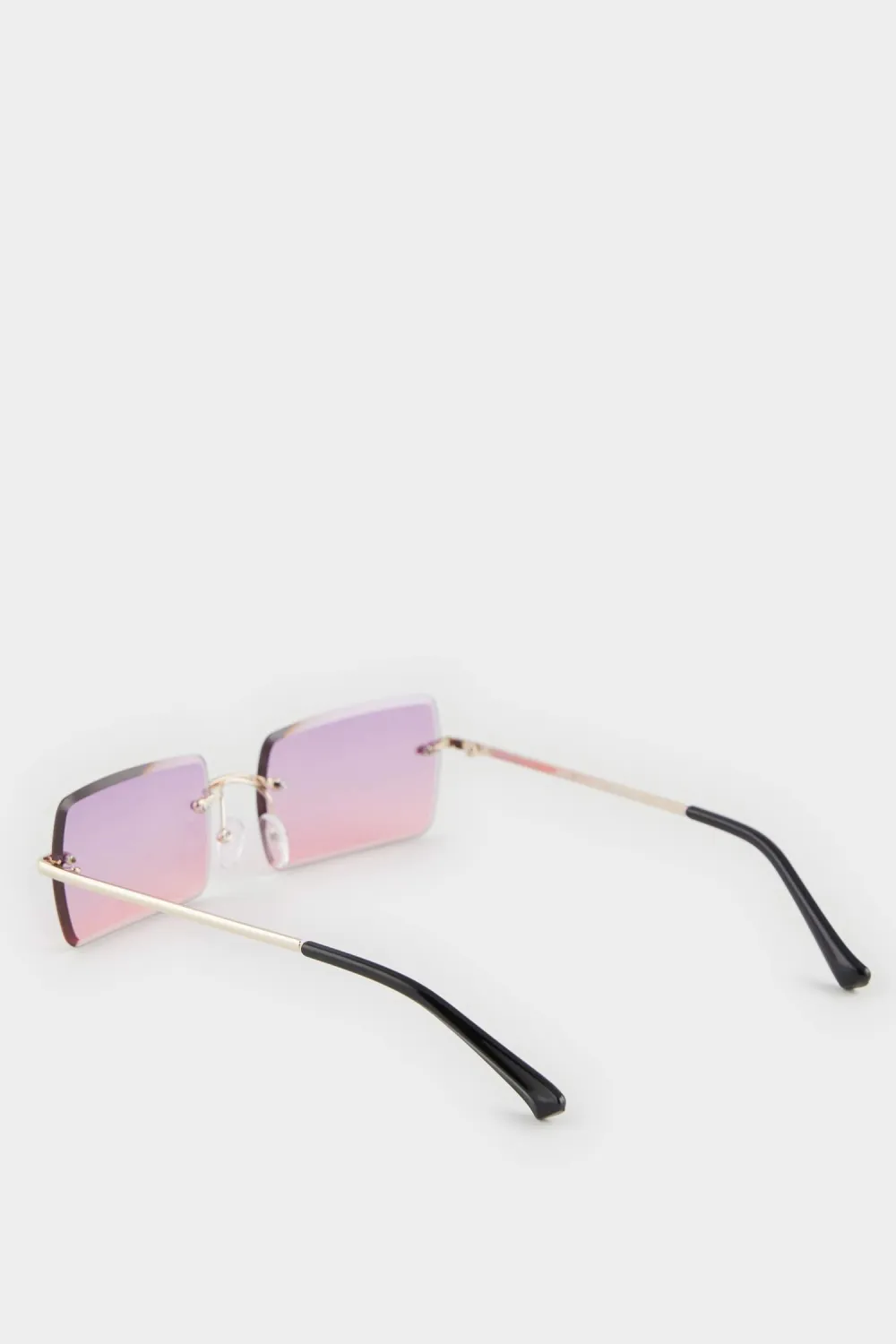 Pink-Lensed Metal Rimless Glasses